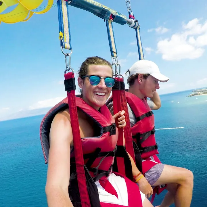 a person standing in front of a body of water