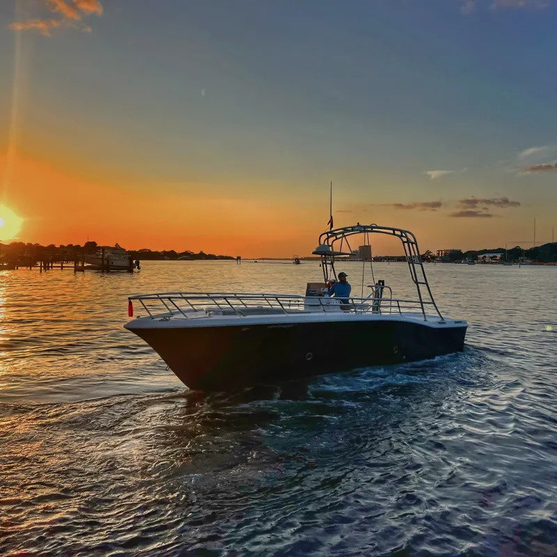 a small boat in a body of water